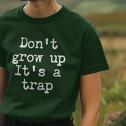 A person wearing a dark green Funny Slogan T-shirt with white text reading
