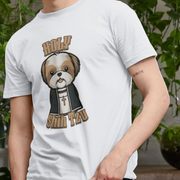 A person wearing a white Dog T-shirt with a cartoon of a Shih Tzu dressed as a priest, featuring a cross necklace and the words
