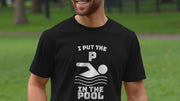 Man in a park wearing a black funny slogan t-shirt with playful text: