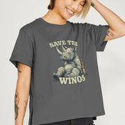 Smiling Woman wearing a gray Novelty T-shirt with a sitting rhino and a bottle, featuring the text