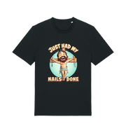 black funny jesus t-shirt with the graphic of a cartoon jesus on the cross and the slogan 'just had my nails done'