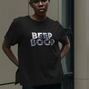 A Woman wearing a black Geek Sci Fi t-shirt with the phrase 