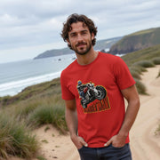 Man with wavy hair in a red 