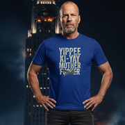 Bald man in a blue Christmas T-shirt with bold text 