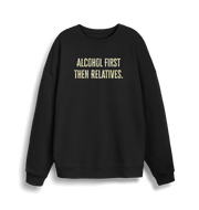 black christmas sweater with the slogan 'alcohol first then relatives'