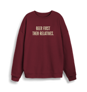 burgundy christmas slogan sweater with 'beer first then relatives'