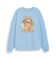light blue christmas sweater with the graphic of santa stood between two women and the slogan 'boats and ho ho ho's'