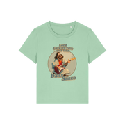 green funny jesus t-shirt with the graphic of jesus playing a guitar and the slogan 'lord give us this day our daily shred'