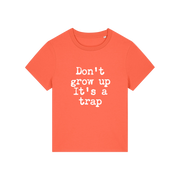 orange funny slogan t-shirt that reads 'don't grow up it's a trap'