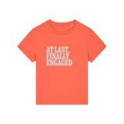 orange matching t-shirt with the slogan 'at last finally engaged'