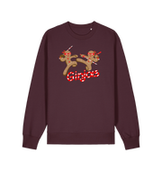 red brown christmas sweater with the graphic of two gingerbread men fighting with candy canes and the slogan 'ginjas'