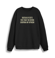 black christmas sweater with the slogan 'instead of giving gifts this year i'm giving everyone my opinion'