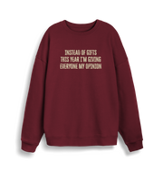 burgundy christmas sweater with the slogan 'instead of giving gifts this year i'm giving everyone my opinion'