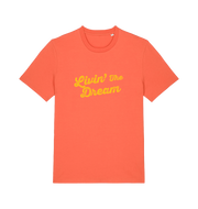 orange slogan t-shirt with 'livin the dream'