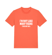 orange funny slogan t-shirt with 'i'm not like most teens im in my 40's'