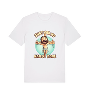 white funny jesus t-shirt with the graphic of a cartoon jesus on the cross and the slogan 'just had my nails done'