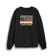 black christmas sweater with a retro design and the slogan 'nakatomi plaza hotel and convention centre'