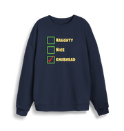 navy christmas sweater with the slogan 'naughty nice knobhead'