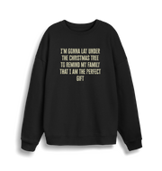 black christmas sweater with the slogan 'im gonna lay under the christmas tree to remind my family that i am the perfect gift'