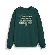 green christmas sweater with the slogan 'im gonna lay under the christmas tree to remind my family that i am the perfect gift'