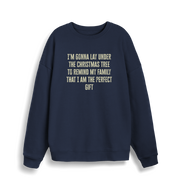 navy christmas sweater with the slogan 'im gonna lay under the christmas tree to remind my family that i am the perfect gift'