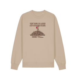 sand christmas sweater with the graphic of rudolph stood on top of a pile of reindeer and the slogan 'they used to laugh and call him names used to... '