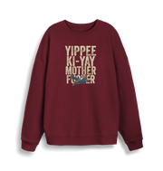 burgundy christmas jumper with the graphic of a man falling and the slogan 'yippee ki-yay mother fucker'
